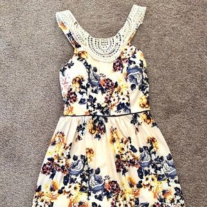 Peach dress with flower detailing